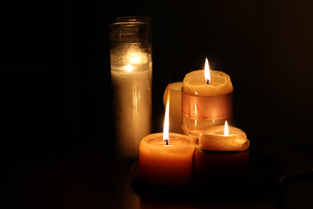 Glowing candles in warm light